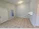 Dining area with tile floors and access to kitchen at 4031 Tumble Wood Trl # 203, Tampa, FL 33613