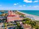 Stunning aerial view of a beachside resort with pristine white sand and clear turquoise water at 407 41St Ave, St Pete Beach, FL 33706