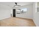Large bright bedroom with hardwood flooring and a modern ceiling fan at 407 41St Ave, St Pete Beach, FL 33706