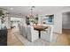 Spacious dining room with elegant furnishings, an area rug, and a view of the kitchen at 407 41St Ave, St Pete Beach, FL 33706