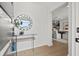 Welcoming entryway featuring stylish decor and a glimpse into the dining room at 407 41St Ave, St Pete Beach, FL 33706