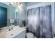 Clean bathroom with white vanity and shower/tub combo at 4573 Deltona Blvd, Spring Hill, FL 34606