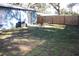 Fenced-in backyard with a patio and grassy area at 4684 25Th S Ave, St Petersburg, FL 33711