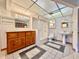 Bathroom with shower, toilet, vanity, and tiled flooring at 4825 Sierra Madre Dr, Tampa, FL 33634