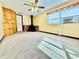 Bedroom with wood-burning fireplace and carpet flooring at 4825 Sierra Madre Dr, Tampa, FL 33634