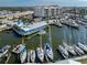 Aerial view of waterfront community with marina and boats at 507 Tamiami N Trl # 201, Venice, FL 34285