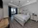 Spacious main bedroom with water views and a large bed at 507 Tamiami N Trl # 201, Venice, FL 34285