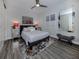 Guest bedroom with a queen bed and calming decor at 507 Tamiami N Trl # 201, Venice, FL 34285