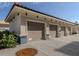Attached three-car garage with neutral tones at 507 Tamiami N Trl # 201, Venice, FL 34285