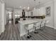 Modern white kitchen with stainless steel appliances at 507 Tamiami N Trl # 201, Venice, FL 34285