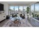 Bright living room with water views and comfortable seating at 507 Tamiami N Trl # 201, Venice, FL 34285