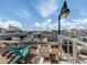 Waterfront seating area overlooking marina and boats at 507 Tamiami N Trl # 201, Venice, FL 34285