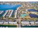 Community overview showing waterway, tennis court, and buildings at 5116 Beach Se Dr # D, St Petersburg, FL 33705
