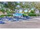 Parking spot with a boat, jet ski, and trailer at 5116 Beach Se Dr # D, St Petersburg, FL 33705