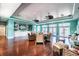 Community lounge with hardwood floors and seating at 5116 Beach Se Dr # D, St Petersburg, FL 33705