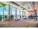 Large covered patio with seating and ocean views at 5116 Beach Se Dr # D, St Petersburg, FL 33705