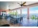 Waterfront patio with seating and ocean views at 5116 Beach Se Dr # D, St Petersburg, FL 33705