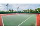 Well maintained tennis court with net at 5116 Beach Se Dr # D, St Petersburg, FL 33705
