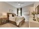 Spacious bedroom with wood bed frame, and neutral decor at 5327 Kelper Hook Ct, Wimauma, FL 33598