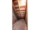 Unfinished basement with wooden stairs at 582 Vallance Ne Way, St Petersburg, FL 33716