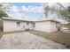 Private backyard with a brick patio and fire pit area at 6350 22Nd N Ave, St Petersburg, FL 33710