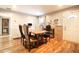 Charming dining area with hardwood floors and a rustic wooden table at 6350 22Nd N Ave, St Petersburg, FL 33710