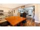 Open concept dining area with kitchen views and hardwood floors at 6350 22Nd N Ave, St Petersburg, FL 33710