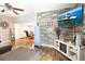 Bright living room showcasing a wood-look wall and ample natural light at 6350 22Nd N Ave, St Petersburg, FL 33710
