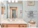 Bathroom with vanity, toilet, and decorative accents at 6519 Grand Estuary Trl # 105, Bradenton, FL 34212