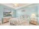 Light and airy bedroom with a king-size bed and ample storage at 6519 Grand Estuary Trl # 105, Bradenton, FL 34212