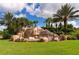 River Strand community entrance with waterfall feature at 6519 Grand Estuary Trl # 105, Bradenton, FL 34212