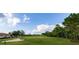 Golf course putting green with sand trap at 6519 Grand Estuary Trl # 105, Bradenton, FL 34212