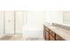 Clean bathroom, featuring a shower and bathtub at 7815 Bronze Oak Dr, Wesley Chapel, FL 33545