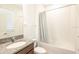 Bathroom with shower/tub combo and granite vanity at 7815 Bronze Oak Dr, Wesley Chapel, FL 33545