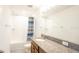 Clean bathroom with shower/tub combo and granite vanity at 7815 Bronze Oak Dr, Wesley Chapel, FL 33545