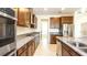 Modern kitchen with stainless steel appliances and granite countertops at 7815 Bronze Oak Dr, Wesley Chapel, FL 33545