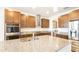 Modern kitchen with stainless steel appliances and granite countertops at 7815 Bronze Oak Dr, Wesley Chapel, FL 33545