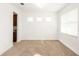 Spacious living room with neutral carpeting and lots of natural light at 7815 Bronze Oak Dr, Wesley Chapel, FL 33545