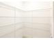 Large walk-in pantry with wire shelving at 7815 Bronze Oak Dr, Wesley Chapel, FL 33545