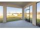 Spacious screened-in porch overlooking the backyard at 7815 Bronze Oak Dr, Wesley Chapel, FL 33545