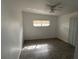 Cozy bedroom with tile floors and a ceiling fan at 1002 N Pebble Beach Blvd # 1002, Sun City Center, FL 33573