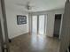 Bright sun room featuring tile floors, and large sliding glass doors for natural light at 1002 N Pebble Beach Blvd # 1002, Sun City Center, FL 33573