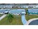 Single story home with driveway and palm tree at 1205 Chevy Chase Dr, Sun City Center, FL 33573