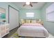 Guest bedroom with double bed and ample closet space at 1205 Chevy Chase Dr, Sun City Center, FL 33573
