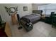 Bright bedroom with a double bed and window coverings at 12500 Capri Cir N # 302, Treasure Island, FL 33706