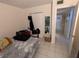 Bedroom with a full-size bed and double door closet at 12500 Capri Cir N # 302, Treasure Island, FL 33706
