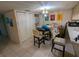 Small dining area with table and chairs near kitchen at 12500 Capri Cir N # 302, Treasure Island, FL 33706