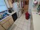 Kitchen with dishwasher, refrigerator, and ample counter space at 12500 Capri Cir N # 302, Treasure Island, FL 33706
