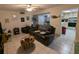 Spacious living room with leather couches and kitchen view at 12500 Capri Cir N # 302, Treasure Island, FL 33706