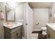 Clean bathroom with updated vanity, shower, and toilet at 1506 Swilley Rd, Plant City, FL 33567